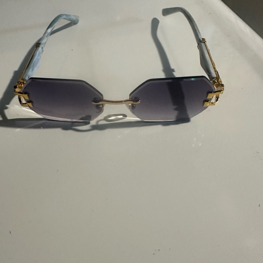 Elegant Gold and Black Sunglasses